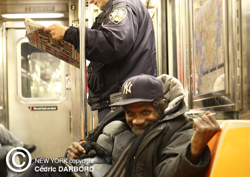 DARBORD-NYC-homeless and cop in subway